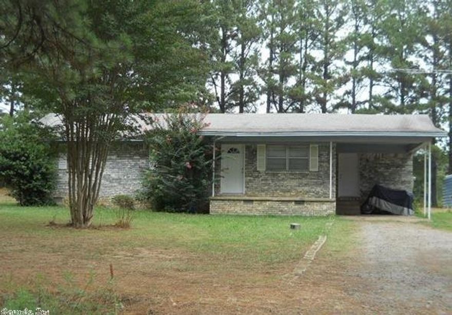 Super cute brick home on the West side of Searcy. House has a large open kitchen and dining, with wood laminate flooring and neutral colors throughout. Lots of cabinets in the kitchen. Good size laundry room has space for washer dryer and freezer. Living room is also neutral colors with large front window. Bedrooms are good size and have nice closets. Bathroom has a vanity/make up area beside the sink. There is a shop in the back yard with a double door plus a walk door in the front.