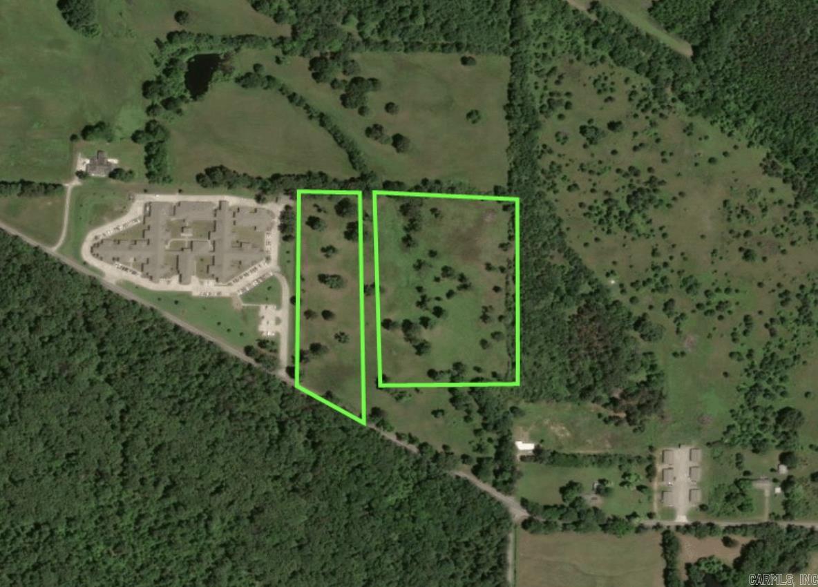 12 ACRES OF ALMOST LEVEL LAND WITH PAVED ROAD FRONTAGE & ALL UTILITIES AVAILABLE. JUST NORTH OF THE POPLAR STREET/BIG DANGER ROAD INTERSECTION. EXCELLENT LOCATION NEXT TO JOHNSON COUNTY HEALTH & REHAB NURSING HOME, A MULTI MILLION DOLLAR COMMERCIAL BUILDING & PROPERTY. ACROSS FROM A BILLION DOLLAR PROPOSED 200+ ACRE PROPOSED DATA CENTER, RUMORED TO BE A GOOGLE FACILITY. 1/4 MILE FROM THE HOSPITAL AND ABOUT 2 MILES TO DOWNTOWN CLARKSVILLE OR WALMART. GREAT SPOT FOR DOCTORS OFFICE, SURGERY CENTER, APARTMENTS, A STORAGE FACILITY OR JUST ABOUT ANYTHING!!!! CALL ONE OF THE THREE LISTING AGENTS FOR DETAILS! CAN BE PURCHASES AS ONE 4 ACRE TRACT OR IN ITS ENTIRETY.