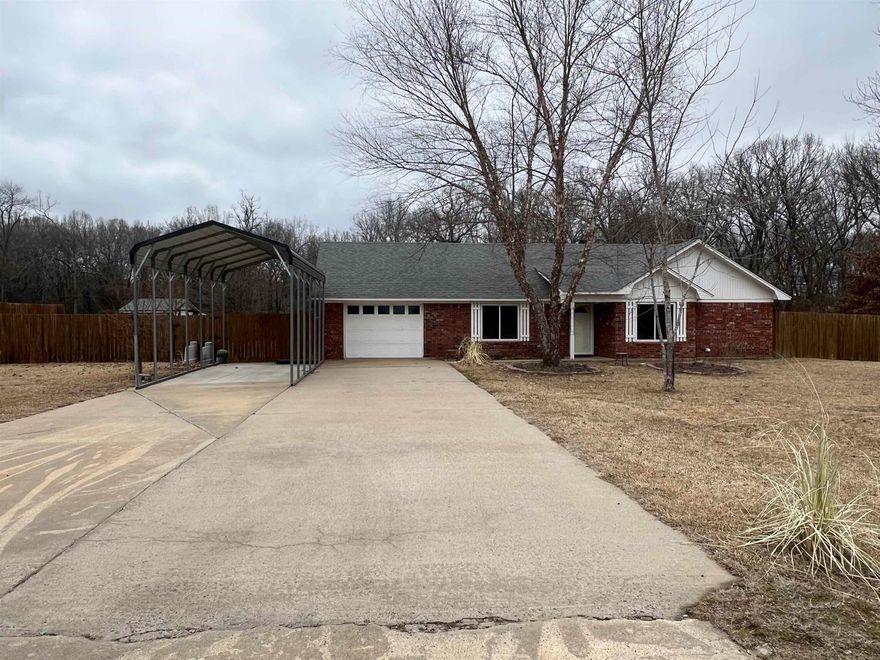 Country living just out side city limits. This charming 3 bedroom one and a half bath sits on just over an acre and at the end of the street. This home features an extra covered carport for storing your camping trailer, boat, or any other vehicle. This home also has a large underground tornado shelter and a shed out back with electricity. Just minutes to shopping center and the interstate. Call today for your showing.
