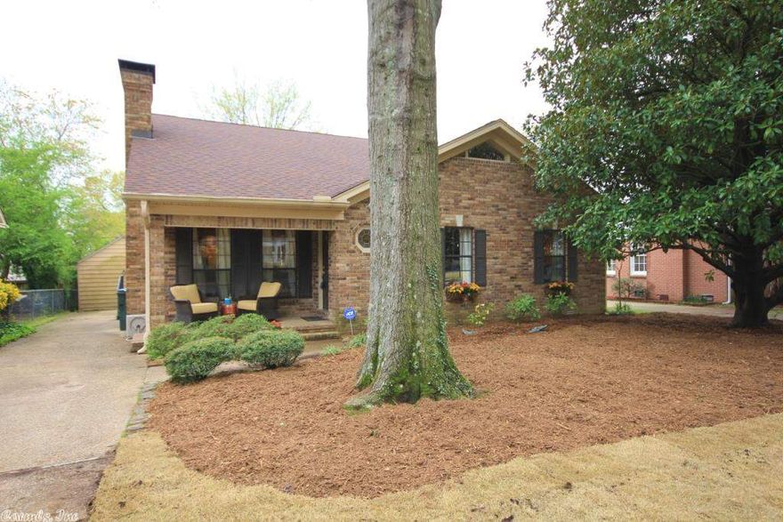 Fantastic Heights home with 4 Bedrooms and Three Full Baths.  Excellent floor plan for family living and entertaining.  Large master suite and guest suite on the mail level.  2 Bedrooms + full bath up.  Large family room with fireplace.  Beautiful two story entry with open staircase.  Pretty hardwd floors.  Large eat in kitchen with granite counter tops and stainless appliances.  Dining with open living.  Level lot with rear deck and great additional detached storage. Great location!