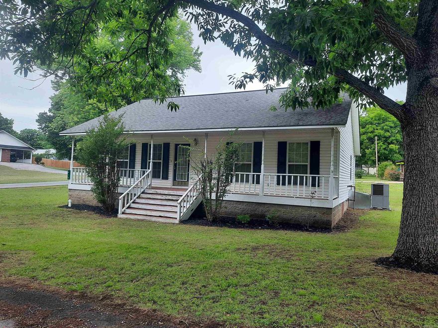 With-in walking distance of the famous Court Square, music, shopping, and several restaurants to choose from, that is where you will find this charming 3-bedroom, 2-bath home. This home offers low maintenance, inside and out, large inviting front porch, back deck, attached 2 car garage, and did I say location is great.  If you are looking for a get-away, full time home, or investment property, take a look.