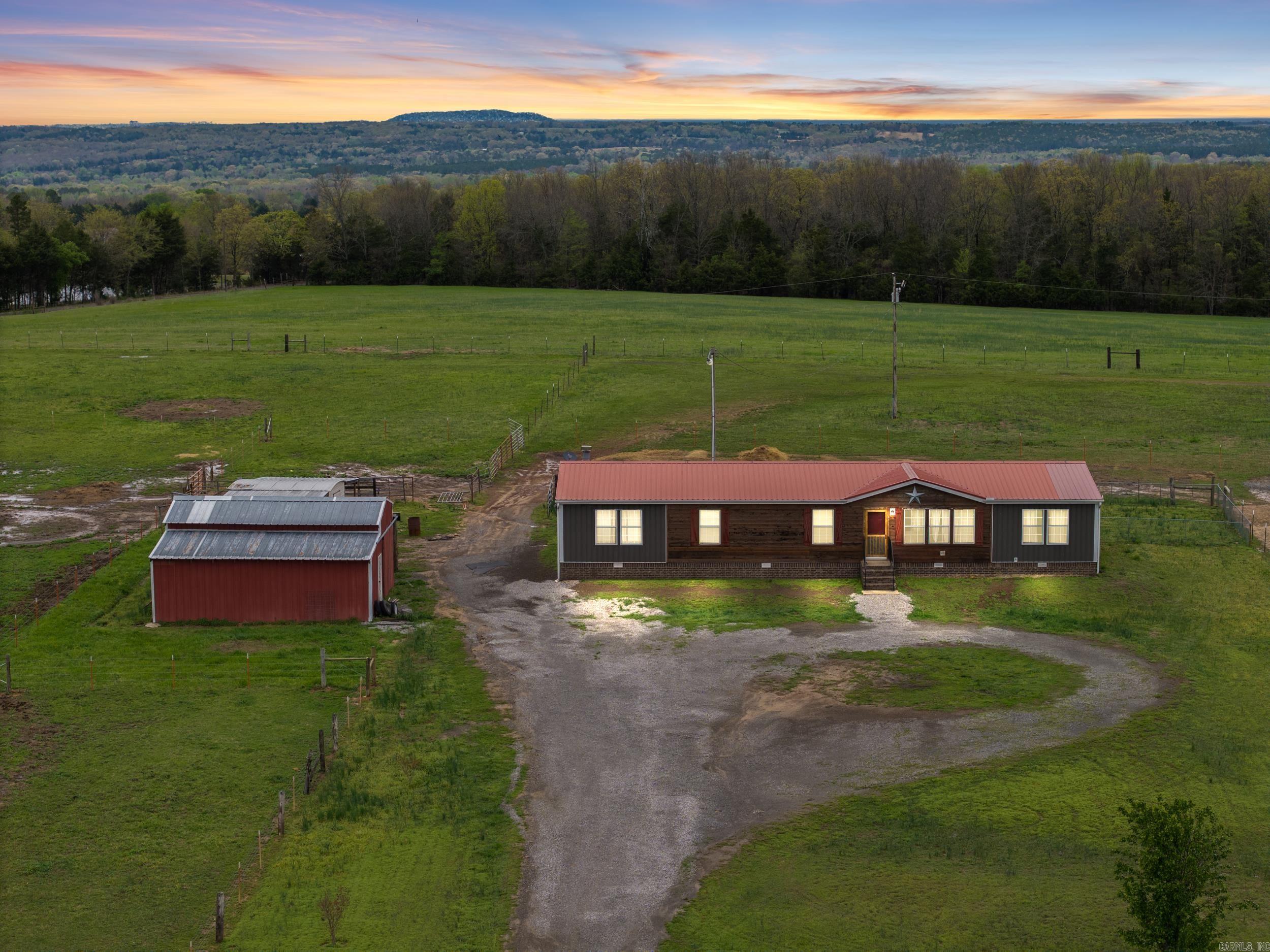 Looking for a slice of paradise in Mount Vernon? Check out this stunning property at 420 Mount Nebo Rd! Spanning over 10 acres of fully fenced flat pasture land, itās perfect for anyone wanting space to roam. Whether you're dreaming of raising animals, starting a garden, or just enjoying the wide-open views, this place has it all! This home features four spacious bedrooms and two baths, making it ideal for families or anyone looking for extra space. With two cozy living areas, there's plenty of room to relax and entertain. You'll absolutely love the large back porch, perfect for sipping morning coffee or enjoying those Arkansas sunsets. Plus, thereās plenty of storage with a shop and a shed on the property, giving you all the space you need for tools, toys, or hobbies. With updates throughout the home and a new HVAC plus a permanent foundation, itās move-in ready and waiting for you to make it your own. Donāt miss out on this amazing opportunityācome see 420 Mount Nebo Rd in Mt Vernon and imagine the possibilities. It just might be the dream home you've been searching for! (GPS 429 Mt Nebo Road and look for sign)
