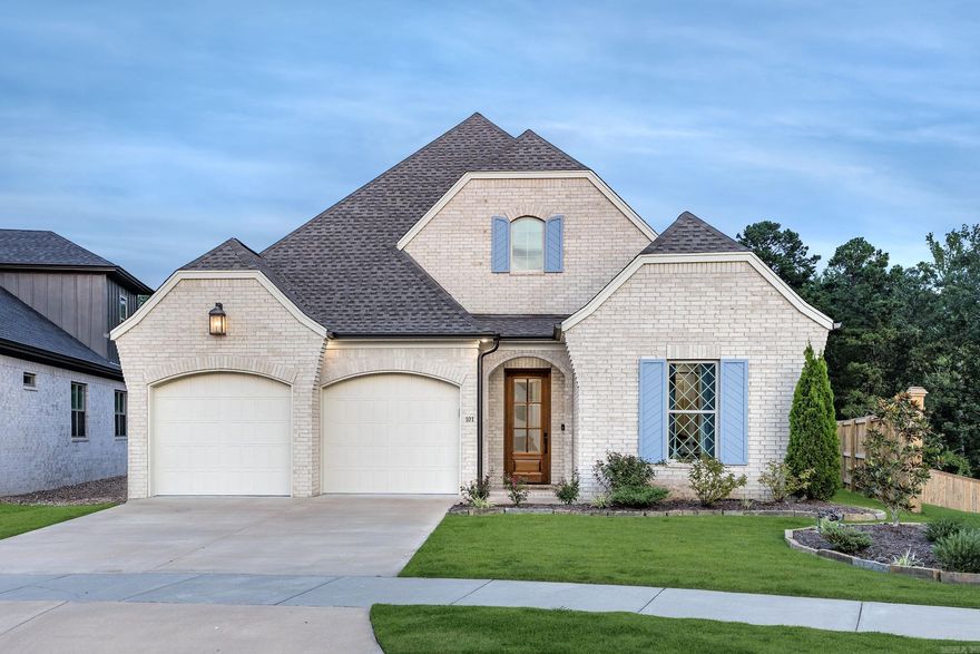 Welcome to 101 Fletcher Ridge Drive, an exceptional 3BR /2BA home offering the perfect blend of modern luxury and natural beauty.  Step inside to an open floor plan that seamlessly connects the living,dining, and kitchen areas, all bathed in beautiful natural light that fills the home and overlooks the serene green space.  The heart of the home is the gorgeous chef's kitchen, featuring an extra-large island with quartzite counters, beautiful custom cabinets, and a spacious pantry.  There is ample room for a beverage cooler and an abundance of storage, making it a culinary enthusiast's dream.  High ceilings and stunning lighting fixtures add to the home's elegant ambiance.  The Primary suite is a tranquil retreat with big windows overlooking  the greenbelt, offering a peaceful view.  The spa-like bath includes a walk-in shower and a large soaking tub, providing a perfect place to unwind.  Two additional guest rooms offer comfort and privacy, ideal for family or visitors.  Outside, enjoy the spacious back covered patio, perfect for entertaining or relaxing, and a cozy fire pit area for those cooler evenings.