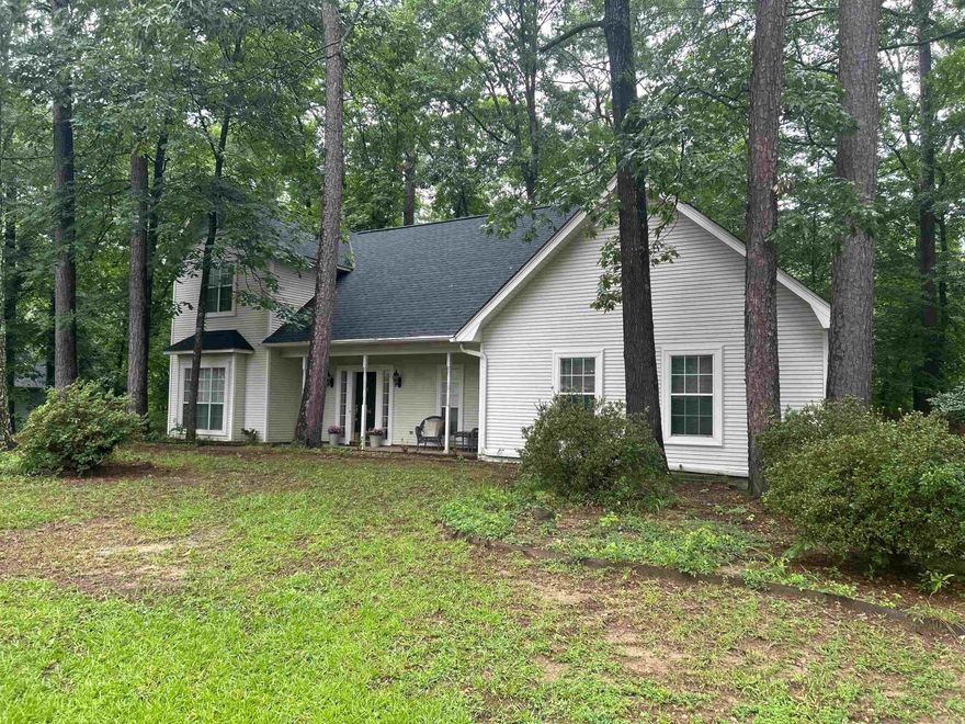 Beautiful Home Featuring 3 Bedrooms with 2 and a 1/2 Bathrooms, hardwood floors, open concept kitchen and a Brand New Roof.