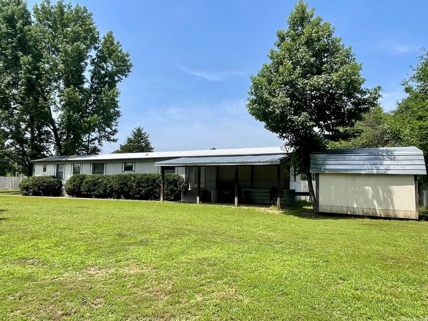 Don't miss the opportunity to own this well-maintained 1990 model mobile home on a scenic one-acre lot with a wet weather creek in Judsonia, Arkansas! With updated renovations such as flooring, metal roof, and new HVAC, this 2 bed 2 bath 1,216 sq ft home is conveniently located near Hwy 67/167 just 6 minutes from Searcy. The primary bedroom boasts a walk-in closet & bathroom with whirlpool tub and separate shower. Kitchen features a breakfast bar, new vent-a-hood, and separate dining room with ample cabinet space. Outside, you'll enjoy a spacious yard offering privacy fenced on 3 sides, outdoor storage shed and covered front porch.