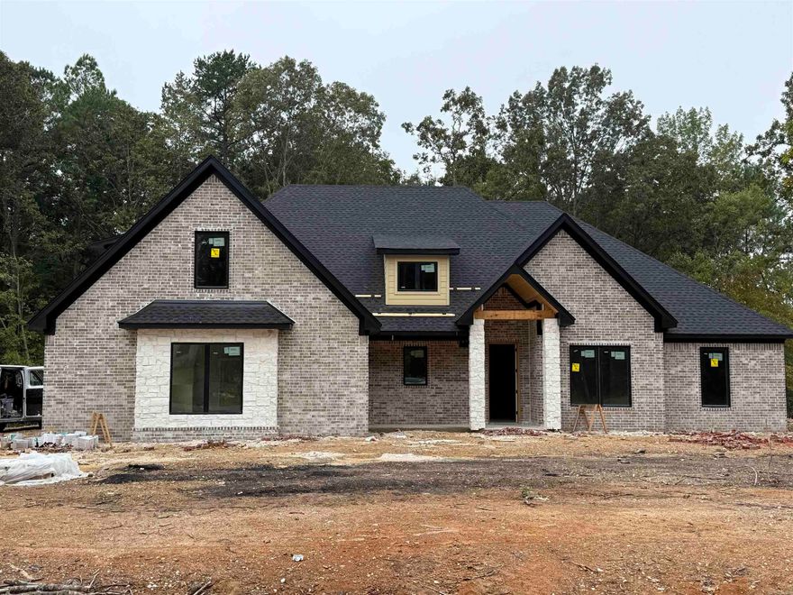 Gorgeous new construction home on 1 acre! 5 spacious bedrooms, 3.5 elegant baths, 3-car garage. Boasts high-end custom finishes, modern open-concept design, and premium appliances. Perfect for family living with ample space and luxury. Move-in ready by Thanksgiving—your dream home awaits! Another stunner by Homes by Hesley
