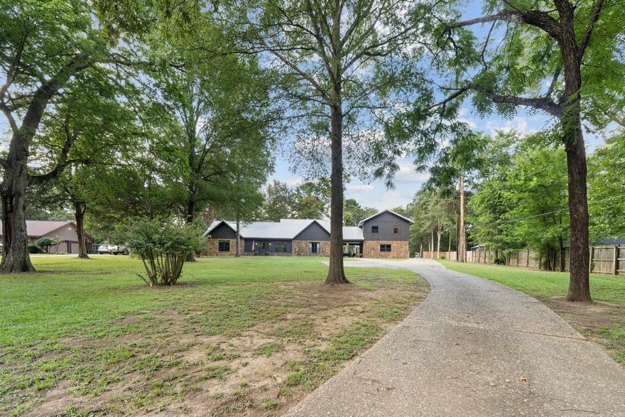 A SPACIOUS HOME with 3093 sq ft., a GUEST HOUSE with 1510 sq ft, AND a SHOP with 800 sq. ft. all on 2.6 ACRES in West Conway! WOW! The main home has so much personality with 3 beds, 3 full baths (two full of vintage flair & one ready for your personal touch), an office, and TWO living spaces! You’ll love details like the pit-style living room, floor-to-ceiling stone fireplace, & an indoor planter that brings a little nature inside. Need even more space? Walk across the charming portico to find the detached 2-bedroom, 1-bath guest house with laundry area & a big open living area with kitchenette hook ups! The big stuff has already been done with this property- over $230K in updates, including new Hardie board siding, Marvin windows, ext doors, lighting, electrical, plumbing, energy-efficient upgrades, city sewer tie-in, privacy fencing & all new electrical panels.  Outside there are mature trees, tons of green space, & so much space to simply enjoy. Let's be real, places like this DO NOT come around often! A few finishing touches are still waiting, giving you the chance to add your style & make it truly yours. Call today!***AGENTS SEE REMARKS