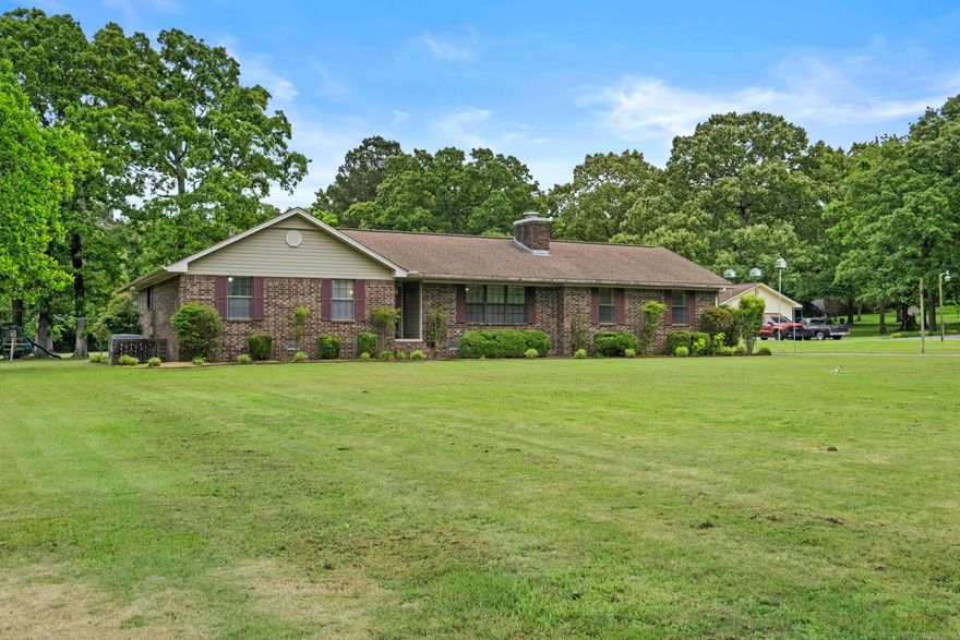 4 bdrms 3 full bath home sitting on 2 acres INSIDE CITY LIMITS with a 20X30 shop. Beautiful hard surface floors throughout,  House has been remodeled with walls  removed in the house to open up the living and dining and kitchen area.  This home has been used for lots of gatherings with ample space inside and lots of deck area outside. Lots of storage in and out of this house. New roof coming, HVAC newer, two water heaters.  2 of the bedrooms are primary suites .  Lots of natural light shines through this house and watching nature is just outside your windows.   This home is move in ready and is waiting for another family to make memories here!