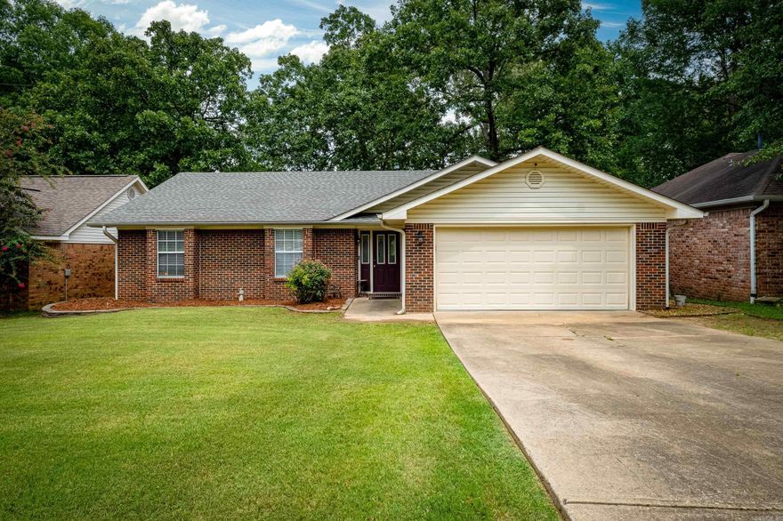 Perfectly situated with easy access to Maumelle Blvd and I-40, this home offers the best of both worlds: seclusion and convenience. This 3-bedroom, 2-bath home features a large, open living room with vaulted ceiling. The kitchen features updated appliances and a large opening with passthrough window/bar that connects to living room. There is separate dining room in addition to a sitting area/breakfast nook off the kitchen. The split floorplan features a secluded primary suite with an all-new primary bath with walk-in closet and shower. Enjoy extra living space in the all-season sunroom (not counted in SF), which opens to a private deck with pergola, perfect for outdoor entertaining. The private and secluded backyard offers a level, offering a low-maintenance lawn with ample space to relax and entertain. A storage building provides extra convenience. The two-car garage is a versatile space with an epoxy-sealed floor, utility sink, and a pull-down screen door, creating an indoor/outdoor living area. Water heater 2023. HVAC 2017. AGENTS PLEASE SEE REMARKS
