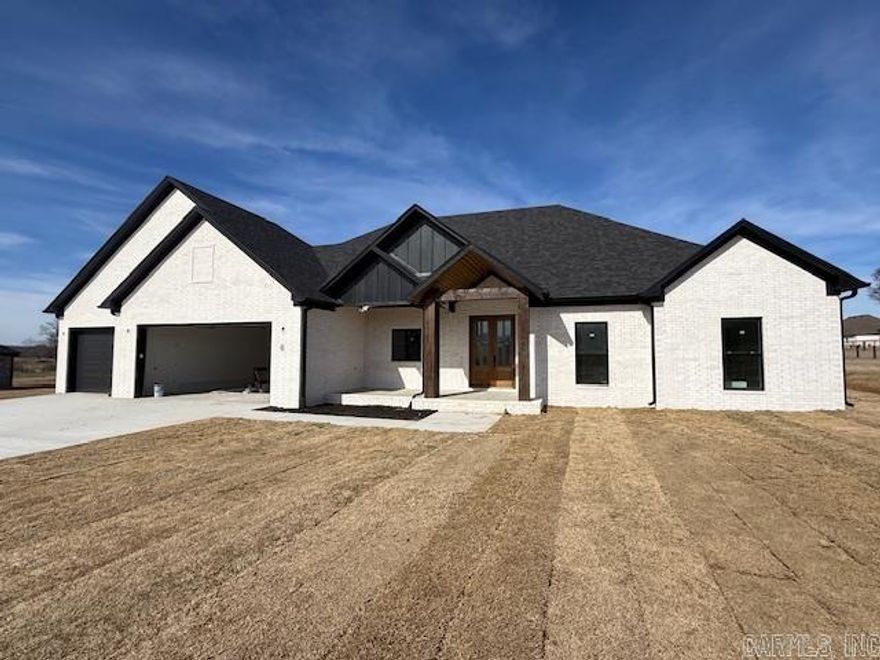 What a beautiful view from the front and back of your home! The views of the sunsets in this subdivision are unmatched. Enjoy watching the cows graze in the pasture behind the home. The home has been thoughtfully designed with large windows overlooking the large backyard. The living room and kitchen are open concept with a nice dining space as you come in the front door. The kitchen has a large island for cooking and entertaining with lots of storage. The pantry is also huge. The primary bedroom is separate from the guest bedroom. The primary bath has two separate vanities with a soaking tub, tile shower, and private water closet. The guest bath has two sinks with a large vanity.  You will appreciate the storage in this home with the massive walk in closet in the primary bedroom and large guest closets. Also abundant cabinetry in the laundry room.  Come see this home in a fabulous subdivision North of Greenbrier.