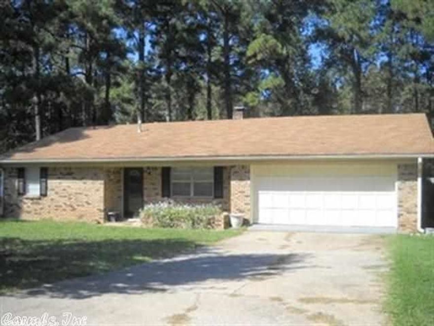 TAXES WITHOUT HOMESTEAD CREDIT. SUBURBIA SEWER IMPROVEMENT DISTRICT 1 TAX $172.25 PER YEAR. ROOF, INSIDE PAINT AND CARPET FEW YEARS OLD.  3BR/2BA SITTING ON 1/2 ACRE LOT. LARGE KITCHEN AND DINING COMBO, LARGE LIVING AREA WITH WBFP, GLASS ENCLOSED PORCH AND 2 CAR GARAGE.