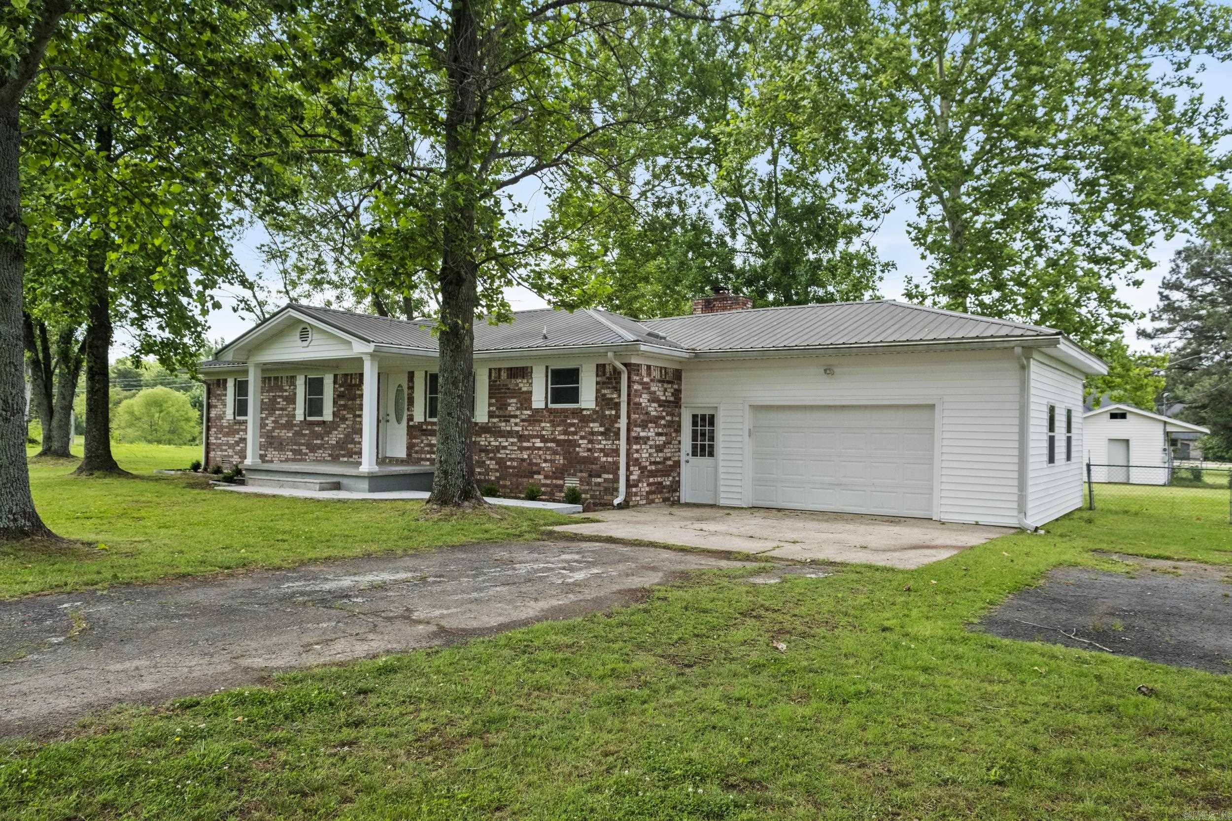 Everything you need!! 4 bdrm 2 bath remodeled home sitting on 2 picturesque acres. Fenced in back yard, huge shade trees with an outbuilding that has divided fenced area for some small animals. 1784 sq ft in the house that has been remodeled with new flooring, new water heater, updated kitchen, walk in tiled shower and spare bath that has updates too. Master bath has duel rain shower heads for that extra relaxing shower after a hard day. split floor place and kitchen, living and dining room are all open. Newer windows, HVAC has been serviced and working well. This property is a good fine in that it is convient to going to Searcy or to Little Rock.