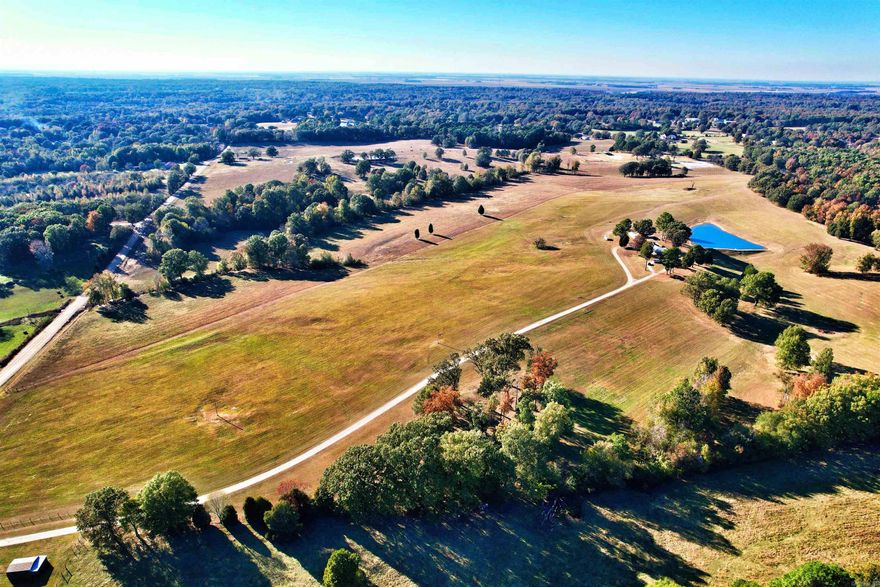 One of the most beautiful properties in Craighead County is officially on the market. Properties like this are a very rare find. Prime location approximately 1 mile from Jonesboro city limits. And roughly just 5 minutes from Downtown Jonesboro and the Medical Mile. Breathtaking views and scenery, this one is what dreams are made of. Incredibly charming 4 bedroom, 2 bath recently remodeled home is move-in ready. Updated kitchen, new appliances, remodeled bathrooms, and many other upgrades. Home location on property is secluded, offering the utmost privacy. A fully stocked pond offers a backyard paradise just steps away from the backdoor, also providing amazing views from the living room. A small barn is also on property in close proximity to home, could be used for a variety of purposes. Deer & turkey are in abundance on property and roam frequently. The rolling land is stunning to say the least and offers a total of 3 ponds. Majority of property is cleared but does offer some wooded areas as well. You truly cannot put into words how incredible it is. Opportunities are endless on this captivating property!