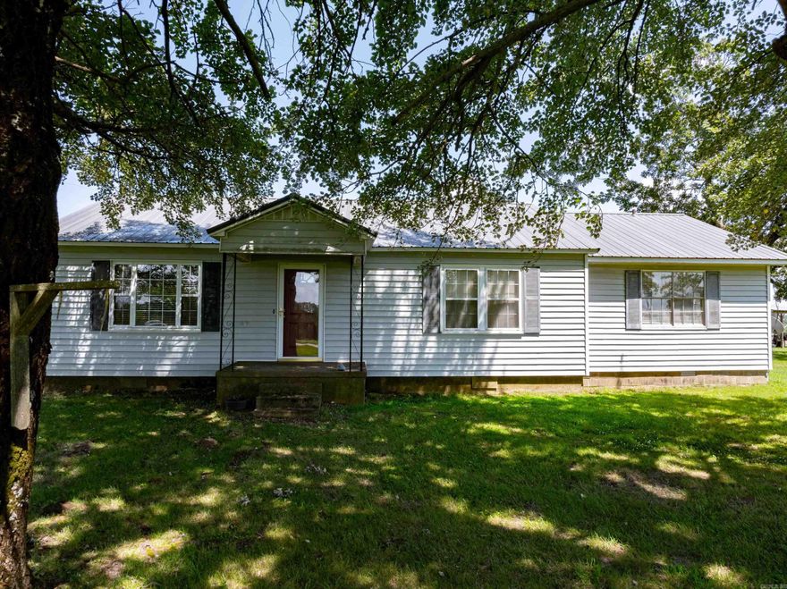 Discover the perfect blend of rural charm and modern convenience with this stunning 55 +/- acre property, ideally situated between Locust Grove and Concord in the quaint community of Almond. Nestled along the Heber Springs Highway, this property offers an excellent location in the heart of the Ozarks.Boasting over 2,300 feet of highway frontage, this expansive estate is fenced and cross-fenced, providing an ideal setup for livestock.The lush pastures are perfect for grazing, while the wooded areas offer superb hunting opportunities. With two ponds on the property, you'll have ample water sources for your animals and a serene setting to enjoy the great outdoors.The charming home on this property features three bedrooms, making it perfect for a family or those seeking extra space for guests. An office space is available for work or study, and the nice-sized living room offers a comfortable area to relax and entertain. The large kitchen is perfect for preparing meals and gathering with loved ones, while the convenient laundry room is located just off the back door.Outside, you'll find a detached garage and an insulated shop, providing plenty of space for vehicles, tools, and projects.