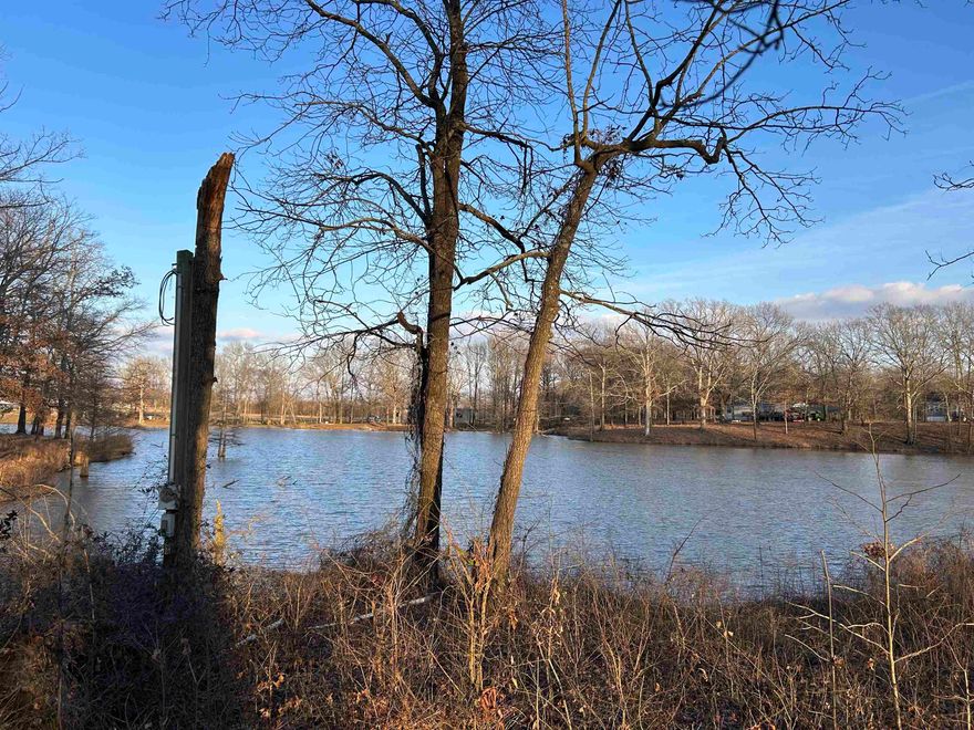 Don't miss the opportunity to own this waterfront property in Des Arc! This would be a great place to build a home or a cabin for a hunting retreat. RV hookups could be added with water and electric on site and no restrictions. The current owner has cleared trees, made road improvements and done dirt work for a boat ramp to access the small fishing lake that is next to the property. Lake Des Arc and White River access are just minutes away for hunting, fishing, or boating recreation.