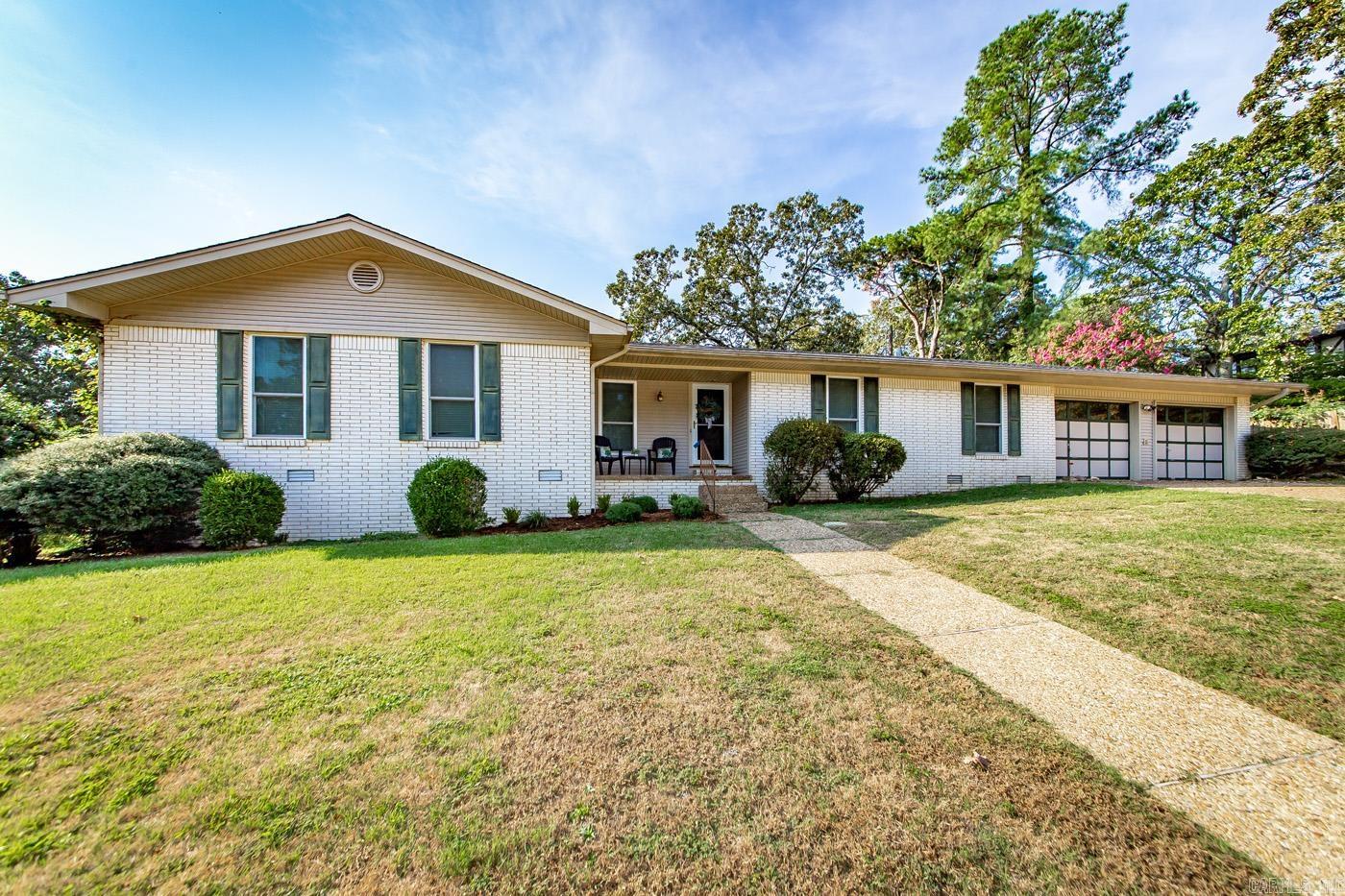 Welcome to 4204 Fox Hill Rd, where space, charm, and unique features come together to create a home like no other! This 4-bedroom, 2-bath beauty sits on a desirable corner lot and offers an incredible 3,028 sq. ft. of living space. Step inside and be greeted by a formal living room and dining room—ideal for entertaining family and friends—plus a warm and inviting den with a cozy fireplace, perfect for relaxing evenings. One of the bedrooms is oversized and can easily serve as a game room, home office, or the ultimate retreat. The primary suite offers generous closet space and even includes its own sink inside the bedroom for convenience and charm. But the real surprise? A hidden gem of a garage/workshop, complete with its very own built-in safe room! Accessed by ladder through one of the bedrooms, this bonus area is perfect for projects, hobbies, extra storage, or simply peace of mind. The possibilities are endless. Outside, the corner lot provides extra space, curb appeal, and a welcoming presence. The location is just as special—just minutes from shopping, dining, and the option to join the Lakewood Property Owners Association, where membership unlocks lakes, pools, parks