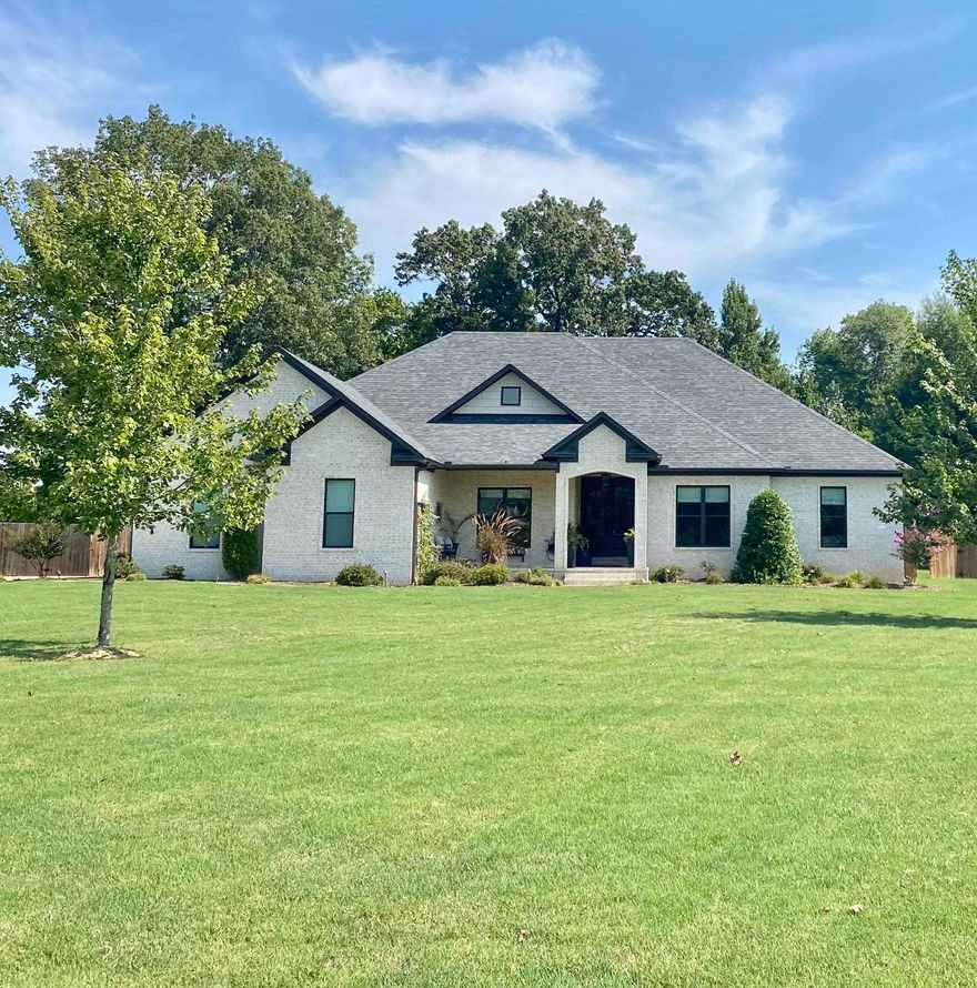 Gorgeous lot Peaceful subdivision Custom Traditional home on 2.6 acres in a wonderful established neighborhood, fully fenced with beautiful wooded area in the back affording complete privacy. Nice landscaping with lighting, and a large covered back patio, housing a full wood-burning fireplace with gas starter. A pergola is attached to offer additional entertainment possibilities. A six-person hot tub conveys with the property, along with a firepit area. There is a fenced garden with a utility shed and five raised garden beds. Transfer of info from MLS #24-1450 for entry