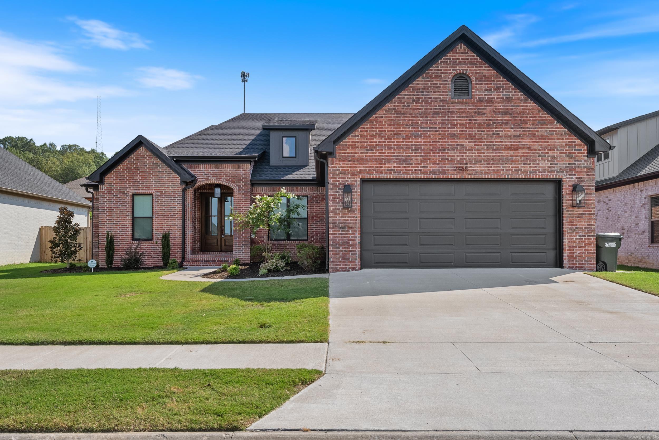LIKE NEW HOME IN BEAUTIFUL ROBYNMAR! STUNNING 3BR/2.5BA RESIDENCE FEATURING AN OFFICE, MUDROOM WITH BUILT-INS AND FORMAL DINING ROOM. THESPACIOUSE KITCHEN BOASTS A 12' ISLAND, BREAKFAST NOOK, GAS RANGE, PANTRY AND STYLISH TILE BACKSPLASH. ADDITIONAL UPGRADES INCLUDE A TANKLESS WATER HEATER. THE LUXURIOUS PRIMARY SUITLE OFFERS A SOAKING TUB, CUSTOM-TILED SHOWER, DUAL VANITIES, AND AN OVERSIZED WALK-IN-CLOSET. A NEUTRAL COLOR PALETTER ENHANCES THE ELEGANT DESIGNER LIGHT FIXTURES THROUGHOUT. COZY UP BY THE ELECTRIC FIREPLACE AND ENJOY THE PERFECT BLEND OF COMFORT AND SOPHISTICATION THIS HOME PROVIDES. CALL 501-244-0333 TO SHOW.