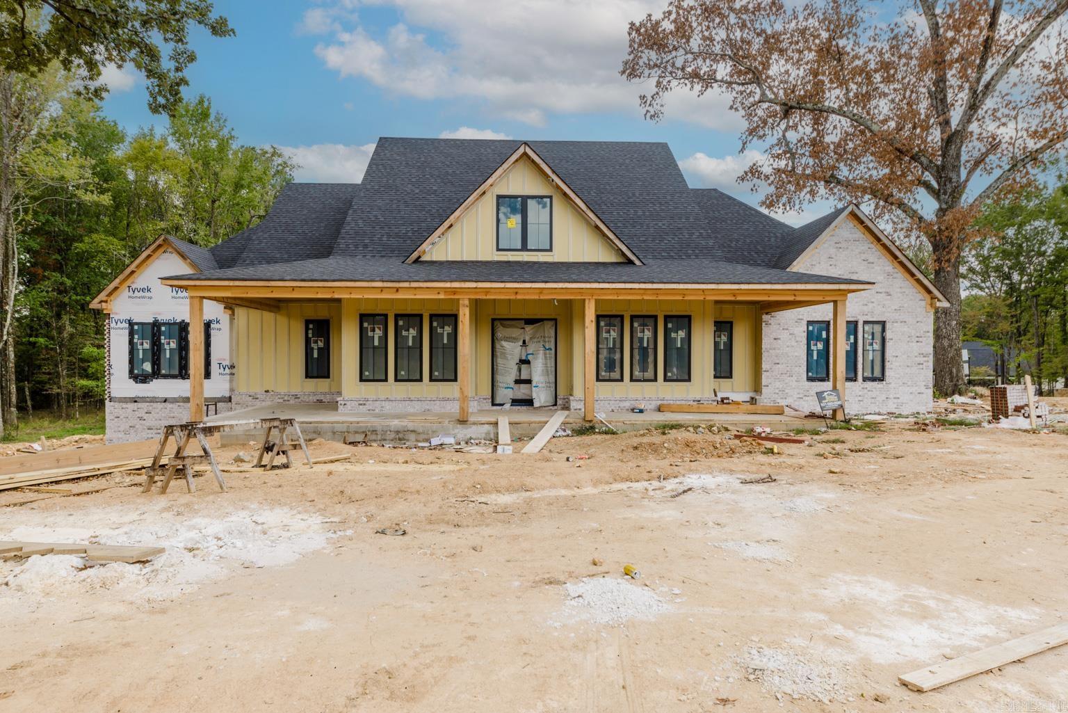 Don't miss this stunning new construction home in Hazel Oak of Benton! You will appreciate everything this expansive home has to offer. The builder has thought of everything for this home, with features that include: wood floors and stairs, wooden beams, huge bonus room, pre-wiring for surround system, custom accent walls, and spray foam insulation The kitchen is a chef's dream with double ovens, ice-maker, custom cabinetry, both a walk-in and butler pantry, and a large island. The special touches extend to the outside as well, with a large covered patio featuring a fireplace, irrigation system, and a 3-car garage. This 5-bedroom, 4.5-bathroom home has everything needed for making family memories.