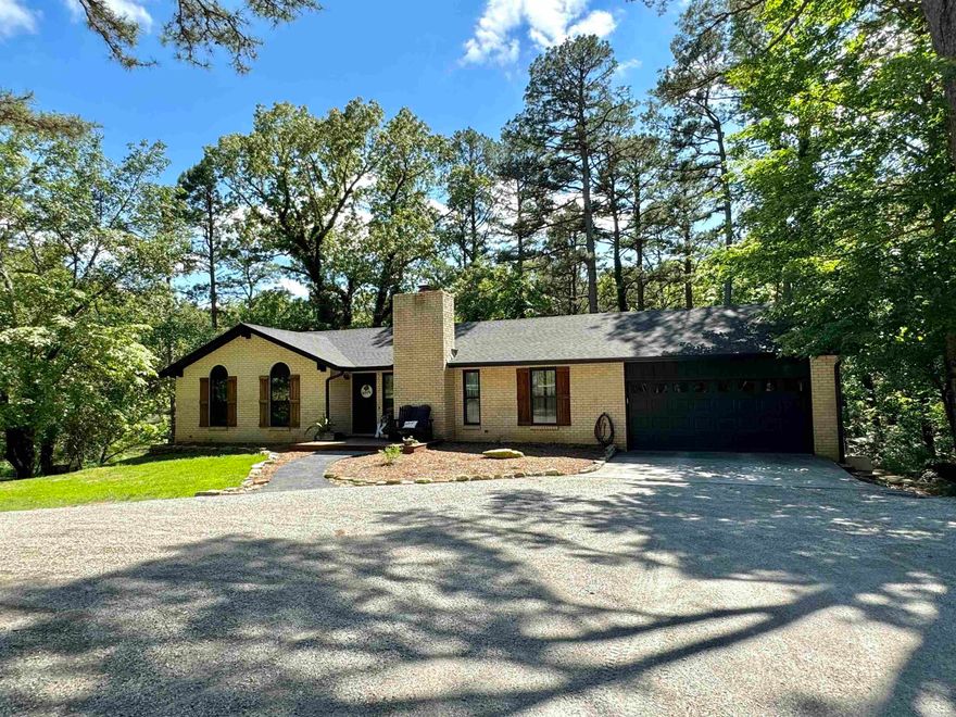 Are you looking for a home in the country, but close to town? This stunning home has been completely remodeled & has so much to offer! The main floor features an open floor plan with vaulted ceilings and a gas log fireplace in the living area, custom cabinets, stainless appliances, pantry, & a large island in the kitchen. Primary Bedroom with a large walk in closet and a full bathroom with walk in tile shower and double sinks! The walk out basement has a second living area, 2 large bedrooms, full bathroom, work out room & laundry room!  There is a large back deck on the home plus a patio area and a two vehicle garage.  The acreage is mostly wooded, offering privacy, has a barn, fenced in area, storage building, and small pond! Give me a call today to see this remarkable home!