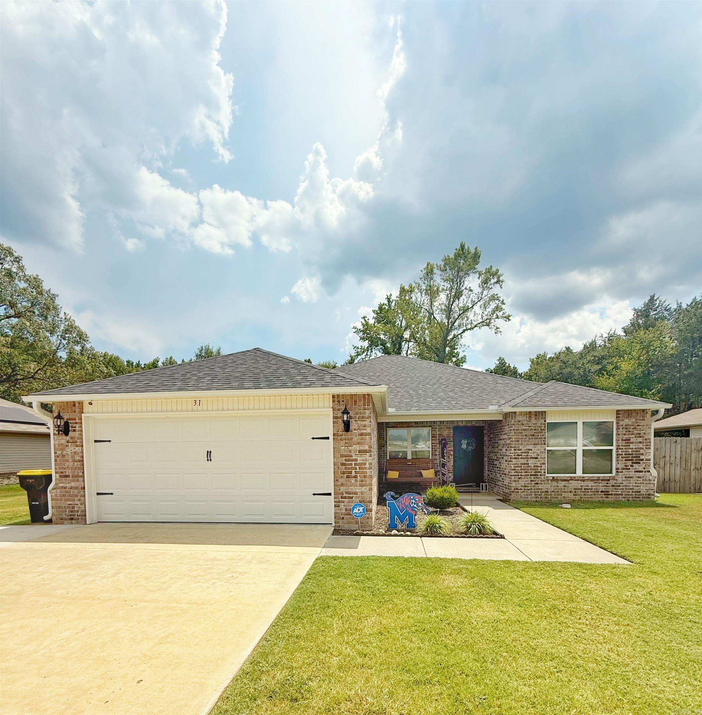 Tucked away in a beautifully maintained neighborhood in Austin, Arkansas, this charming 3-bedroom, 2-bath home is as inviting as they come. With 1680 square feet of living space, it’s been kept in immaculate condition and boasts a brand new roof, a gorgeous kitchen with stainless steel appliances a pantry, and a spacious primary suite with a large walk-in closet. The enclosed sunroom-style back porch is the perfect spot to unwind, overlooking a private, fenced backyard complete with a storage shed for all your outdoor needs. You’ll also enjoy the convenience of a double car garage and the peace of mind that comes with a full security system, including outdoor cameras and door sensors. This home is the perfect blend of comfort, beauty, and functionality—ready for you to move right in!