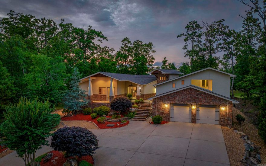 Exquisite one owner custom home on #3 tee of Granada Golf Course with unobstructed views of Lake Estrella. Enjoy the location of this beautiful, peaceful home located in quiet subdivision with cul de sac. Mid century modern features provide views from every room. Enter double doors to soaring 18 ft ceiling. Vaulted great room with hickory distressed wood flooring, stacked stone gas fireplace with built ins. Great room opens to kitchen and eat in dining. Alderwood cabinetry with granite countertops, spacious breakfast bar with storage, stainless steel appliances and built in buffet. Tiled flooring continues to large patio plumbed for gas grill. Separate primary bedroom on main level with tray ceiling, wood flooring and wrap around patio. Primary en suite with jetted tub, walk in shower & two sinks with vanities. Walk in closet conveniently located to spacious laundry room. Two separate guest rooms, full bath and half bath, mudroom and storage areas complete this main level. Upstairs enjoy two bedrooms, & full bath with sitting area. Oversized garage with 700 lb wt lift, large heated and cooled basement, 500 gallon buried propane tank. SEE AGENT REMARKS for more details & amenities.