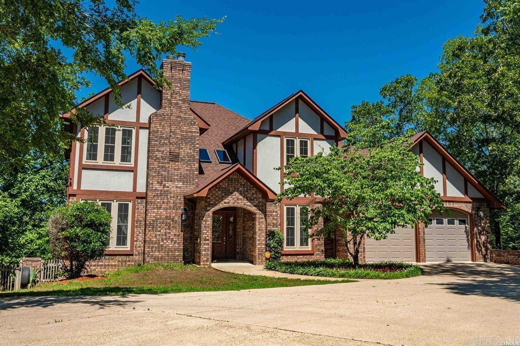 Nestled at the end of a secluded neighborhood and sounded by natural beauty is a charming Tudor home offering a plethora of must haves on your checklist. This property is conveniently located walking distance from restaurants, hospitals, schools, and a shopping center. With a short 2-minute drive to the Oaklawn Racing Casino Resort, hotels, grocery stores, banks and more, your new home is in a desirable location for your family whether it's big or small. There are 5 bedrooms, 5 full bathrooms, an office, 2 living spaces, a renovated kitchen, 2 fireplaces, 3 decks, 2 car garage, storm room, an additional kitchenette. Donāt miss out on this rare find. Seller holds active Arkansas real estate license.