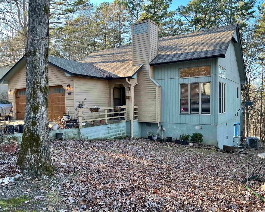 Cute 2bed 2bath home just inside the West Gate Hot Springs Village. All hardwood floors,plantation shutters, nice Kitchenaid appliances with double oven,Quartz countertops, Skylights, Electric fireplace insert,Vaulted ceilings, Large Covered Deck for entertaining, Workshop and storage on the lower level, Encapsulated foundation.  Roof replaced in 2018, Also nice Arkansas room for extra dining or plants ect.