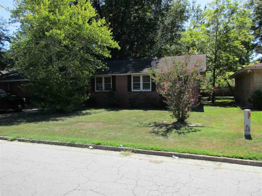 Brick home with big backyard.  Hardwood floors in bedrooms and living room. 3 bedrooms and 2 baths.   Lots of kitchen cabinets.  Large master bathroom.  Call today for your personal tour. ** Agents see remarks**