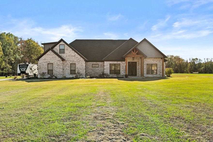 This Breathtaking 4 Bedroom, 2 1/2 Bath property is perfectly situated on close to 3 Acres, offering Space, Style, & Serenity! With Custom Details throughout, this home combines charm with modern comforts, creating an ideal haven for your Family! An Open Floor Plan makes up the Great Room with oversized Electric Fireplace, a Formal Dining Room, & Amazing Kitchen with Large Island & Under & Over Cabinet Lighting! The Master Features Custom Touches with it's own Electric Fireplace, Private Bath with Soaking Tub, Walk-in Shower, & Amazing Closet adjoining the Laundry Room! All Spare Bedrooms are Great Size! Upstairs is an Oversized & Well Layed out Bonus Room which could also serve as another Bedroom or Teen Quarters! The Outdoor Living Space Features a Covered Patio complete with patio swings, and an AMAZING Inground Salt Water Swimming Pool that was just Built in 2023 & Relaxing Hot Tub! Other Features include a 3 Car Garage, Energy Efficient HVAC and Gas Furnace, and a Prep Site for a Future Shop! Every corner of this home exudes Quality & Care. Don't miss the Opportunity to make it yours!