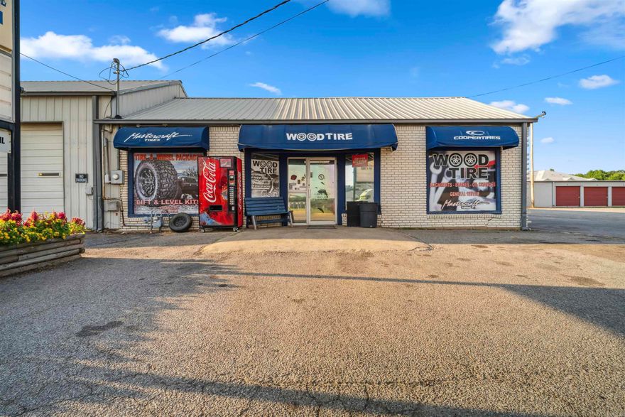 Seize this rare opportunity to own a thriving tire and service center in the heart of Clarksville, Arkansas. Property offers highway frontage, 10,000 sq. ft. of well-maintained space, featuring 7 bays, a waiting area, restrooms, multiple offices, and a spacious attached apartment. The property sits on a generous 1.20-acre lot, providing ample room for expansion or additional services. Business, land, and building are included in this sale. Don’t miss out! Contact the listing agent for more details and to schedule a showing.