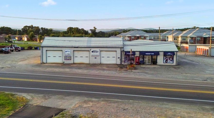 Seize this rare opportunity to own a thriving tire and service center in the heart of Clarksville, Arkansas. Property offers highway frontage, 10,000 sq. ft. of well-maintained space, featuring 7 bays, a waiting area, restrooms, multiple offices, and a spacious attached apartment. The property sits on a generous 1.20-acre lot, providing ample room for expansion or additional services. Business, land, and building are included in this sale. Don’t miss out! Contact the listing agent for more details and to schedule a showing.