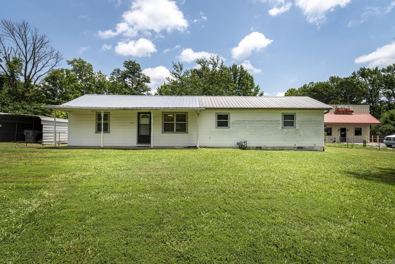 Great Investment Property for a primary residence, rental, or commercial use! Property has an older residential home sitting on over half an acre yard. 3 bedrooms with 3 bathrooms in suite. Excellent closet storage in bedrooms! Eat in kitchen. Spacious laundry room. Property is zoned residential and has commercial 2 zoning available for future use possibilities.