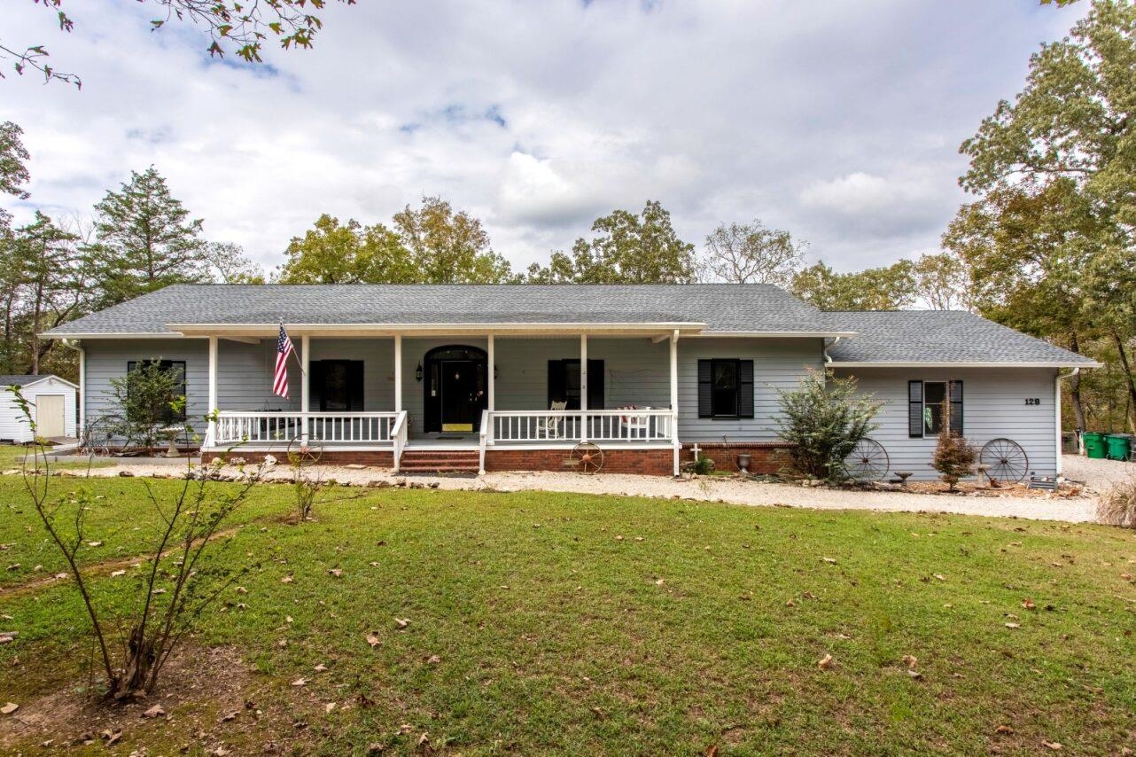 Riverfront Home with Walkout Basement & 2 Living Areas - Cherokee Village, AR This beautiful property sits on 2 acres along the South Fork of the Spring River. You'll be just minutes from the Spring River, Lake Thunderbird, Lake Sequoyah, Lake Cherokee, Lake Sherwood, and Lake Omaha. This spacious home offers over 4,000 square feet under roof, including 4 bedrooms, 3 bathrooms a fully finished walkout basement and 2 full kitchens, making it ideal for multi-generational living or guest quarters. The main level offers 3 bedrooms & 2 baths with a fully equipped kitchen that opens to a large living room with fireplace that extends to an enclosed sun porch. Step out onto the back deck that overlooks 300+ ft of river frontage. Add'l features include a master bedroom that extends out to the sunporch, a huge master bathroom with jacuzzi tub, a formal dining room, an oversized double garage, & a long covered front porch. Downstairs, the walkout basement offers a complete 2nd living area with its own newly installed kitchen, pantry, bedroom, large bathroom, laundry room, safe room and huge living room with fireplace. A covered patio extends to the steps leading down to the river
