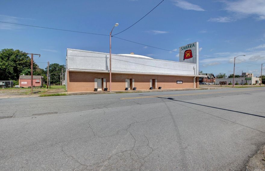 Take a look at this amazing opportunity! This is a great property for your very own business! It could be utilized for may different businesses including a restaurant, café, lounge, retail sales, office space and much more! It is located close to many new renovations and exciting updates in the downtown Pine Bluff area. The property offers 3 private offices, a large gathering room with bar area, large ball room with stage, commercial grade kitchen with large dinning room, tons of storage, multiple meeting rooms and a loading area. 30-35 parking spaces plus curbside parking! Call today to schedule a private showing!