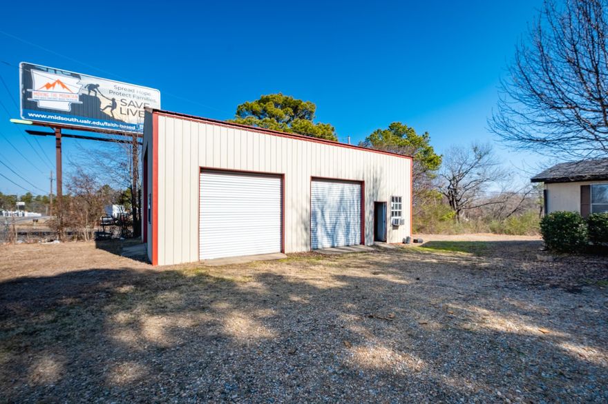 This property is zoned commercial and is being sold “AS IS” and Cash Only. Shop is 40x30 concrete and insulated on slab with Electrical. Full Disclosure it doesn’t have the water from City to mobile home but is at the street for buyer to bring to property.  Also, doesn’t have sewer or septic.  Buyer would need to add. The property next door can be purchased with it and it has shared water and septic with this property. All can be purchased together.  Sold separately the septic and water currently hooked up to mobile home will be disconnected. Mobile home will need to get water line brought in and septic tank added. The property next door is a one level all brick home. See agent remarks for details.  *SEE DUPLICATE MLS# 25005856 & MLS# 25005728 FOR PROPERTIES LISTED SEPARATELY*