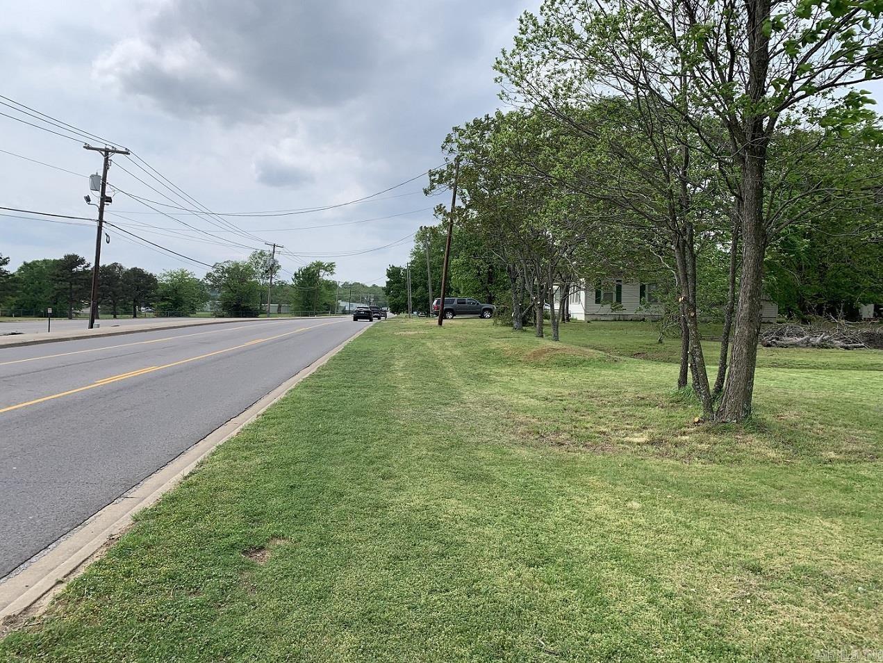 One acre lot on east 16th Street across from Hickey Park and Russellville Senior High School. Currently zoned as residential but would be ideally reclassified as quiet commercial. Busy street with high traffic count. Two structures on the property are not included in the value. The property value is in the land and not the improvements. In close proximity to the Russellville Municipal Airport.