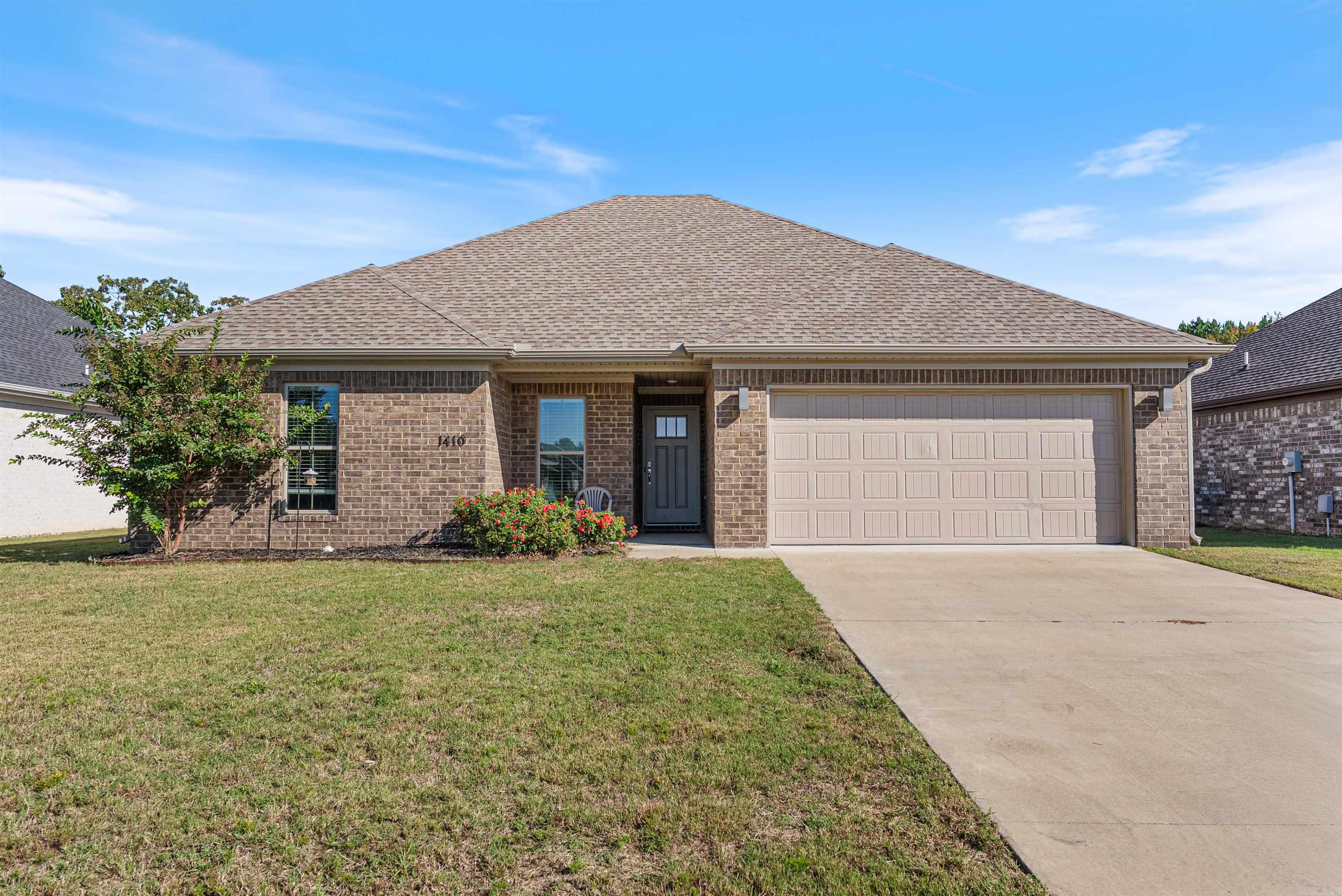 Beautifully maintained 4BR/2BA home in Conway with recent upgrades! Built in 2021, this open-concept home features granite counters, stainless appliances, custom cabinetry, and stylish finishes. The split floor plan offers privacy, and the master suite now boasts a custom walk-in shower and spacious vanity. Enjoy the newly enclosed sunroom/back porch, covered patio space, plus a fully fenced backyard. Additional highlights include a separate laundry room, modern lighting, and blinds throughout. Conveniently located near shopping, dining, and schools, this home is a must see!