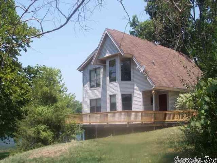 Avail May 1,2020. Wrap around deck. 2 floors. Bedrooms upstairs with full bath. Downstairs 3/4 bath, large living room, and eat in kitchen. Only a few minutes to shopping, up hill from South Fork of the Spring River, and just outside of Cherokee Village.  Rent includes water service and pest control.  Tenant just pays rent, electric, and trash. New roof 2015.