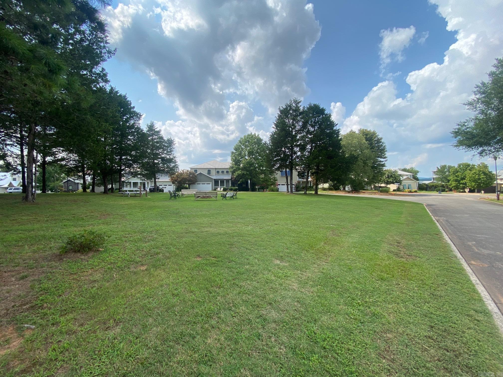 Beautiful manicured lot in the subdivision of Brighton Pointe which is nestled on the shores of Greers Ferry Lake. This gated community is top notch offering a swimming pool, common areas, with beautiful homes at every turn. This community is convenient to everything, with Dam Site Marina literally under 5 minutes away.