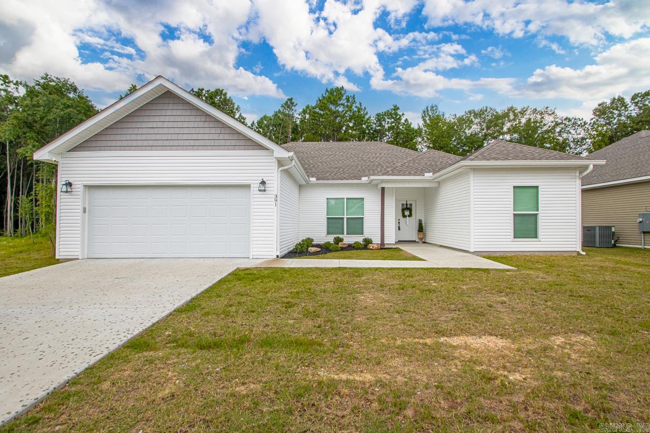 Still Like NEW! But you have a privacy fence, faux wood blinds & gutters that have been added! Such a precious place to call home!! You will find 4 bedrooms two full baths and a very spacious great room & kitchen! Great Room is super sized! Kitchen features stainless steel appliances & a pantry!! Fabulous primary suite with an amazing walk in closet!! All bedrooms are of nice size!! Luxury vinyl plank flooring(no carpet)! Wonderful backyard with lots of privacy looking at beautiful trees. Come take a look!!!