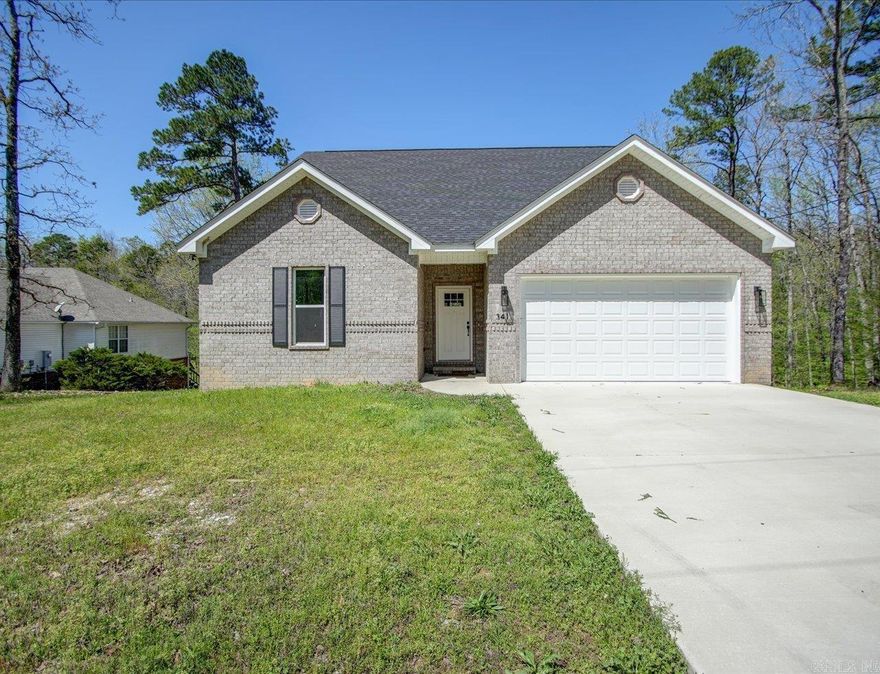 Carefree Living in Diamondhead – Modern Comfort Meets Resort-Style Amenities  Welcome to easy living in the heart of the Diamondhead Community in Hot Springs, AR—a neighborhood known for its golfing, boating, fishing, community pool, tennis and pickleball courts, and year-round activities for all ages.  This 2022-built single-family home offers 1,803 sq ft of thoughtfully designed space with a modern open floor plan and soaring cathedral ceilings. The stylish kitchen features a large island with breakfast bar, three pantries for ample storage, and seamless flow into the living and dining areas—perfect for entertaining or relaxing.  The floor-to-ceiling gas fireplace is a stunning centerpiece, blending sleek design with cozy warmth. With 3 spacious bedrooms and 2 full baths, there’s room for everyone to enjoy. Step outside to a private backyard retreat, ideal for quiet mornings or evening gatherings.  Don’t miss this must-see home that combines modern design with the vibrant, amenity-rich lifestyle Diamondhead is known for.