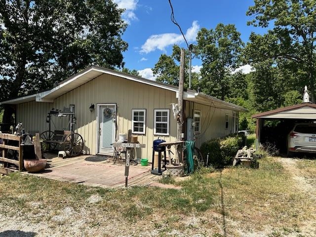 3 br, 1 ba, country home with great views of a heart shaped pond. Pond is filled by an artesian spring that runs year round. Eat in kitchen, living room, 3 bedrooms and extra living space. Living room has cedar wall coverings. Home has 2 woodburning shoves and Central heat and air that is 2 years old. Metal roof and steel siding that is 2 years old. Small shed to house your tools in. 2 bay detached garage that is insulated and has a hot tub in it. One car carport. Lots of room on 5 acres of land. Call for an appointment to see this fantastic home.