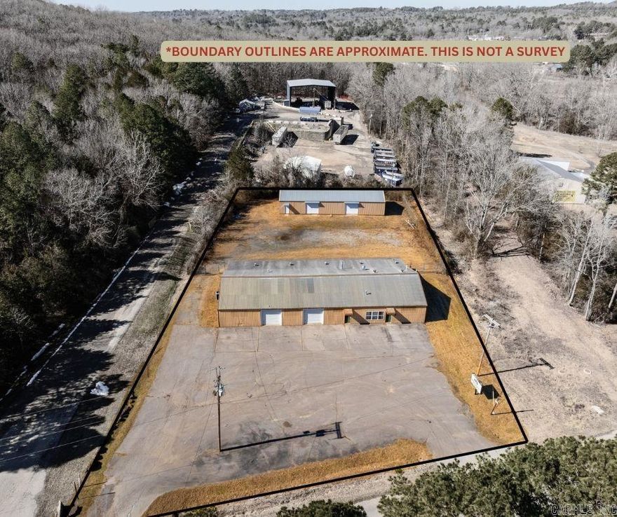 WORK, STORE & GROW — PRIME COMMERCIAL OPPORTUNITY IN HEBER SPRINGS  Position your business for success at 150 Libby Road in Heber Springs. This versatile commercial property offers approximately 5,800 +/- square feet in the main building, situated on a one-acre lot with ample room for parking, equipment, and expansion. There is an additional shop building at the bank of the property with 2000 +/- square feet. Previously operated as an HVAC company, the layout is already tailored for functionality and efficiency — but the possibilities extend far beyond its former use.  The property features a welcoming front office space, a bathroom, and extensive storage areas, making it ideal for businesses that need a combination of administrative space and warehouse or shop functionality. Whether you're in construction, plumbing, electrical, landscaping, automotive repair, manufacturing, distribution, or looking for a service-based headquarters, this setup offers the infrastructure to get to work immediately.  With two separate buildings, the property allows for operational flexibility — use one for office and customer interaction while dedicating the other to storage, equipment, or production.