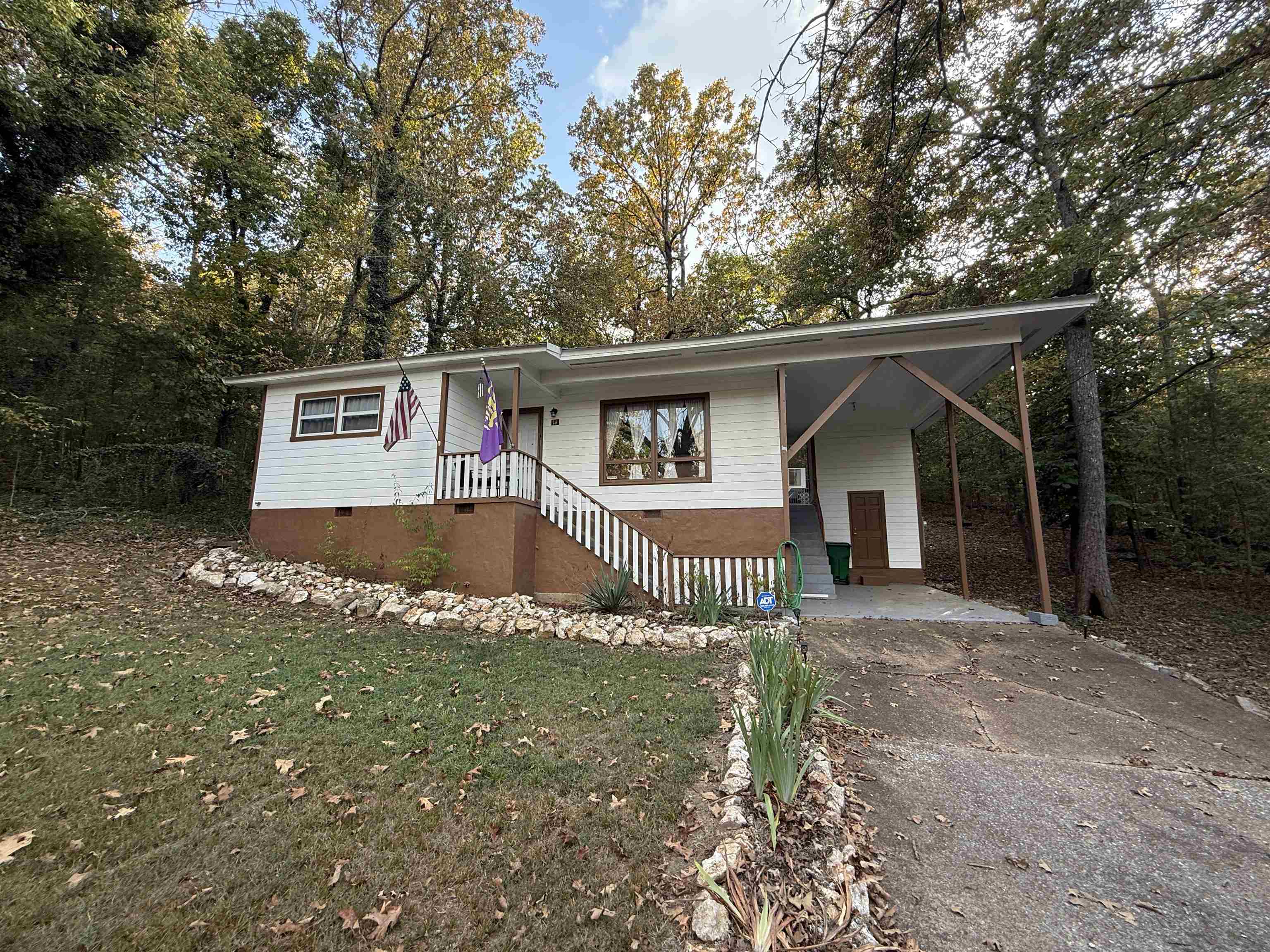 This cute little house is nestled in the woods in Cherokee Village. Peaceful location where you can get away from the busy life. Fully furnished and ready for someone to take retreat! All electric with wall-mount gas backup heat. Elec cook stove/oven, microwave, countertop dishwasher, refrigerator, washer & dryer all included! Two full-sized beds. Dressers, tv's and mini split heat/air in each bedroom! One bedroom has an office desk with a printer & office chair ready for your business or personal needs. Window heat/air in livingroom. There's also a security system installed. Rent does not include utilities. Each adult must complete an application. $39 will be added to rent to cover pest control, liability insurance and credit reporting services.