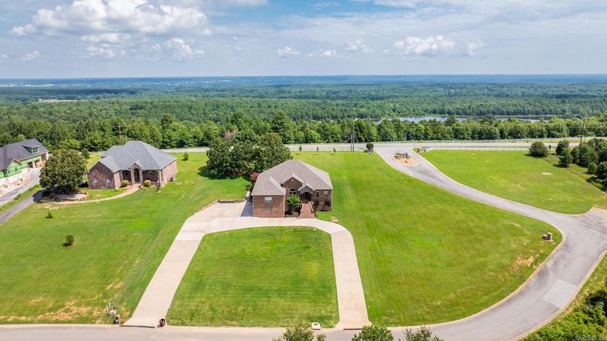 Amazing 4.625 assumable loan !!Beautiful custom built home with room for everyone. This gorgeous home has many upgrades and features including a gourmet kitchen with a commercial size 'fridge/freezer double oven, gas cooktop, built in ice maker and tons of counter tops and cabinets. Open concept with 5 bedrooms and 4 baths, all with walkin closets. Lg master bath with shower and jacuzzi tub sitting room, office and two huge bonus rooms. Fireplace can be wood or gas. Enjoy stunning views and large screened porch, all on over an acre of land. Home has a security system, central vac, oversized 3 car garage with an added interior workshop, safe room and tons of storage throughout the whole home. Country feel but conveniently located and only 20 min to LRAFB. See list of features in attached docs.