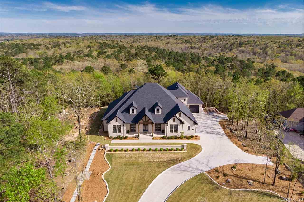 Stunning Home with Gorgeous Views and Wonderful Privacy! Exquisite Finishes! Expansive front porch which overlooks green space. Beautiful Entry opens to large foyer and dining with pass-thru Butler Pantry.Open Great Room & kitchen w/views of lush greenbelt Stunning Chef's Kitchen. Private master suite with beautiful detailing, barn door to spa bath retreat & dream closet. Additional 3 bedrooms suites on main level w/private baths.Upstairs has Bonus or 5th Bedroom/full bath! ONE OF A KIND See agent Remarks.