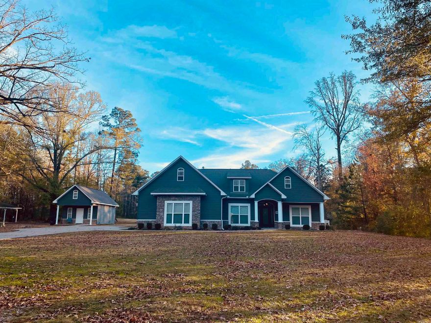 3-bedroom, 2-bath home with a finished over the garage bonus room with half bath  on approximately 4 acres in White Hall. Property includes a stocked pond and a shop. Great space for outdoor enjoyment, hobbies, or extra storage.
