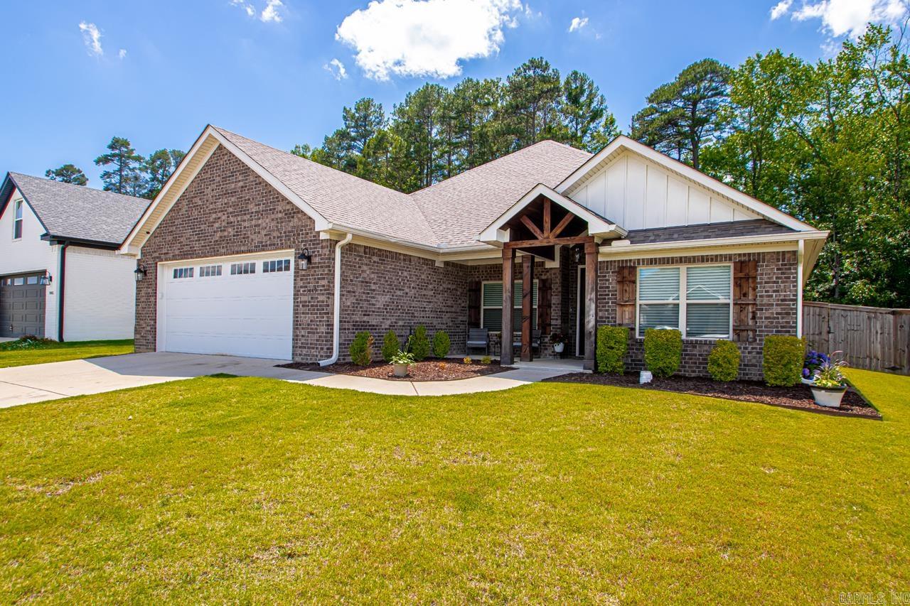 Welcome to this move-in ready 4 bedroom, 3 full bath home with an office in Benton. Featuring an open floor plan with oversized windows for natural light, this home offers a split layout with walk-in closets, wood-burning fireplace, new interior paint, and a spacious pantry. Enjoy custom features throughout. The exterior boasts great curb appeal with fresh mulch in front beds and low-maintenance rock landscaping in the back. The fully fenced backyard includes three gated entries, gutters, a partially covered extended patio perfect for entertaining, and a charming wooden pergola. Located in a desirable neighborhood, this home combines comfort, style, and convenience. Do not miss your chance to tour this property. Schedule your showing today.