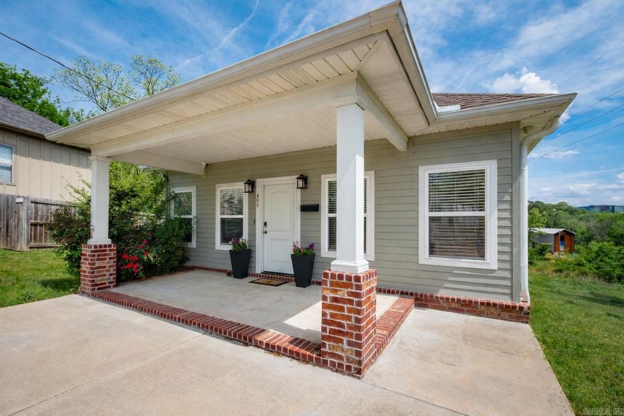 Built in 2017, 400 Rice Street offers modern living in the historic Capitol View neighborhood. Sophisticated finishes throughout give the home a modern yet timeless aesthetic with rich dark-finish wood floors, recessed lighting and a warm, neutral color palette. The kitchen features light gray cabinets with raised-panel doors, granite countertops and tile backsplash. The spacious living room can accommodate lots of seating for guests, a big-screen TV and plenty of additional furniture. Just off the living room is the primary suite which features an elegant walk-in shower surrounded in large-scale rectangular tile and a glass door enclosure. Two additional bedrooms share a large bath with a combination tub/shower. One bedroom is currently used as an over-sized walk-in closet but could easily be converted back. The dedicated laundry room provides additional storage. Enjoy outdoor living on the covered front porch and back deck. There's also ample parking and a large fenced-in back yard. *Note that the back of the home faces Rice Street. Enter the driveway from the intersection of W Capitol & Thayer.